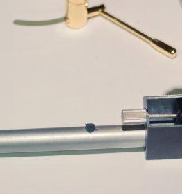 Tonearm universal lifter gold.